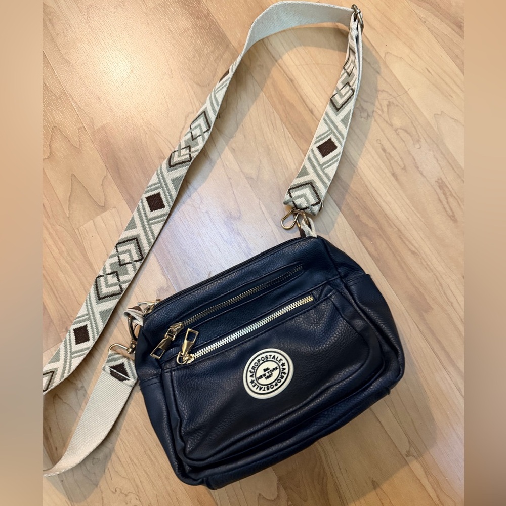 NWOT Aeropostale leather Black Crossbody Bag with Patterned Strap
